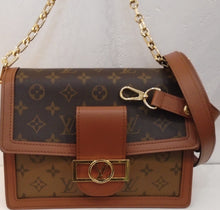 Load image into Gallery viewer, This Louis Vuitton Vintage Two Tone Monogram Dauphine MM has the dark original monogram on the top flap and back. It has the reverse colors on the lower part of the bag. It has gold hardware, a removable adjustable leather strap and a heavy chain strap. The inside of this bag is a soft black.