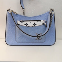 Load image into Gallery viewer, This Louis Vintage Blue Epi Leather Marelle-NM is sky blue in color, textured and has silver hardware. It has a front pocket with the Louis Vuitton Logo in the corner and a white and black change purse inside the pocket. An adjustable shoulder strap is included and the interior of this bag is warm beige.