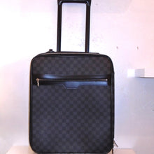 Load image into Gallery viewer, This Louis Vuitton Black Graphite Travel Luggage #45 has a top pull out handle and bottom wheels. It has a zippered pouch in the front and multiple zippered sections inside the case.