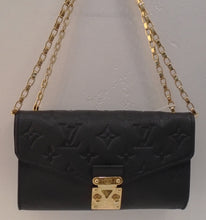 Load image into Gallery viewer, This Louis Vuitton Vintage Black Monogram Saint Germain Mini is embossed on empreinte leather. This bag has gold hardware, and a double shoulder chain. The interior is black, has a zippered pocket and holder for cards.