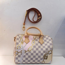 Load image into Gallery viewer, Louis Vuitton Vintage Damier Azure Nautical Speedy 25 has the Damier Azure pattern with gold chains, locks and rope integrated within the pattern. It has gold hardware and camel trim and it comes with a shoulder strap. The interior of the bag is white with a variation of the monogram pattern.