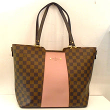 Load image into Gallery viewer, This Louis Vuitton Vintage Damier Ebene Jersey Tote has dark brown trim, gold hardware and a solid mauve piece that attaches to the front center and to the back of the bag. The front of the center piece has the words Louis Vuitton Paris written on the top of it. The top of the bag has a double headed zipper and the interior is a soft mauve.