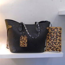 Load image into Gallery viewer, Louis Vuitton Vintage Monogram Wild At Heart Neverfull MM