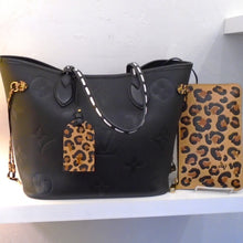 Load image into Gallery viewer, Louis Vuitton Vintage Monogram Wild At Heart Neverfull MM