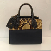 Load image into Gallery viewer, This Louis Vuitton Vintage Navy & Python Small City Steamer bag has a python print across the top quarter of the bag. The double carrying handle appears a navy snake skin. The interior color of this bag is the same as the outside. It has a matching key holder.
