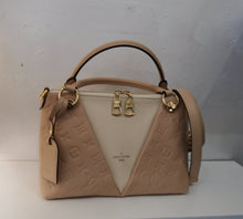 Load image into Gallery viewer, This Louis Vuitton Vintage Rose-Cream V Tote BB is in the Empreinte leather with the rose section embossed with the Louis Vuitton monogram pattern. The center is a white V shape with Louis Vuitton printed on the lower section. This bag has double zippers and double handles with gold hardware. The interior of this bag is a soft rose color.