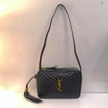 Load image into Gallery viewer, This YSL Black Lou Medium Crossbody Chevron Camera Bag has gold hardware which includes the YSL logo on the front center of the bag. It has a shoulder strap and a tassle connected to the side of the bag. The interior of this bag is black.