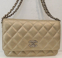 Load image into Gallery viewer, This Chanel Vintage Matte Metallic Gold With Silver Hardware Limited Edition From Runway Edition has the original diamond stitching. It also has a strip of leather woven between the double shoulder strap. The interior of this bag is also gold.
