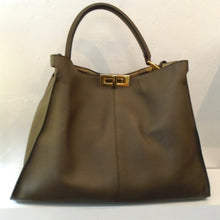 Load image into Gallery viewer, This Fendi Calfskin Peekaboo Tote is brown with gold hardware. It has a stiff carrying handle and is extra roomy inside.
