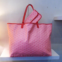 Load image into Gallery viewer, This Goyard Pink Saint Louis GM has the traditional Goyard design and is trimmed in red. It comes with a pouch in the same print. The interior is white.
