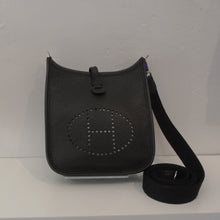 Load image into Gallery viewer, This Hermes Clements Leather Evelyne TPM is a miniature version of the larger Evelyne. It is black with silver hardware and a black interior.

