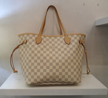 Load image into Gallery viewer, This Louis Vuitton Vintage Damier Azur Neverfull MM has camel tan trim. It has double handles and side ties to keep the opening taut. The interior of this bag is a bright cream color.
