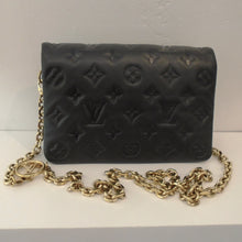 Load image into Gallery viewer, This Louis Vuitton Vintage Black Calfskin Small Coussin is a Crossbody Bag with a detachable shoulder chain. The interior of this bag is pink with two compartments.
