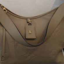 Load image into Gallery viewer, Louis Vuitton Vintage Beige Empreinte Leather Carryall With Pochette
