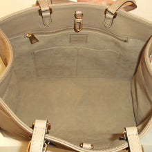 Load image into Gallery viewer, Louis Vuitton Vintage Beige Empreinte Leather On The Go MM
