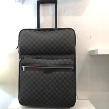 Load image into Gallery viewer, This Louis Vuitton Vintage Black Damier Graphite Pegase #55 has silver hardware, a pull out handle and wheels. It has two zippered sections on the front and a zippered section on the top of the case. It opens up and features multiple zippered sections inside the case.
