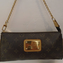Load image into Gallery viewer, This Louis Vuitton Vintage Brown Monogram Sophie Eva is in the original monogram pattern. It has gold hardware which includes the shoulder chain and the attached Louis Vuitton name plate on the front center of the bag. This bag also comes with a detachable camel leather shoulder strap. The interior of this bag is brown.
