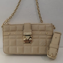 Load image into Gallery viewer, This Louis Vuitton Vintage Beige Quilted Troca Damier is in a checkerboard pattern with a solid and damier stitched pattern. It has gold hardware and detachable shoulder straps. The interior of this bag is also beige
