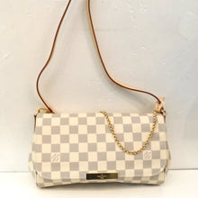 Load image into Gallery viewer, This Louis Vuitton Vintage Damier Azur Favorite has a detachable leather strap included. The gold chain is not detachable. The bag has a small gold Louis Vuitton plaque on the front lip of the flap. The interior of this bag is Cream. This bag is no longer manufactured.
