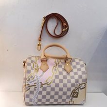 Load image into Gallery viewer, Louis Vuitton Vintage Damier Azure Nautical Speedy 25 has the Damier Azure pattern with gold chains, locks and rope integrated within the pattern. It has gold hardware and camel trim and it comes with a shoulder strap. The interior of the bag is white with a variation of the monogram pattern.
