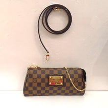 Load image into Gallery viewer, This Louis Vuitton Vintage Damier Ebene Sophie Eva has gold hardware and a large square Louis Vuitton Plaque on the front of the bag. It comes with a detachable leather strap, Original box and Dust cover.  The interior of this bag is red.
