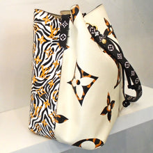 Load image into Gallery viewer, Louis Vuitton Vintage Empreinte Leather Giant Jungle N`eo N`oe
