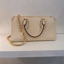 Load image into Gallery viewer, Louis Vuitton Vintage Empreinte Leather On The Go East/West
