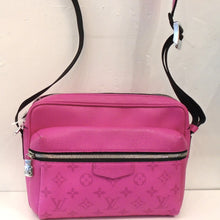 Load image into Gallery viewer, This Louis Vuitton Vintage Hot Pink Llama Outdoor Messenger PM has black trim, a black adjustable shoulder strap and is a double bag with the front shorter than the back. The front piece has a zippered front opening. The front piece has the Louis Vuitton monogram just under the zipper. The interior of the bag is black.
