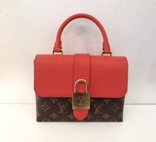Load image into Gallery viewer, This Louis Vuitton Vintage Monogram Locky BB has a red flap and carrying handle while the body of the bag is in the original monogram pattern. It has a padlock design latch in gold hardware and the interior of the bag is a soft red. A leather shoulder strap is included which is also red.
