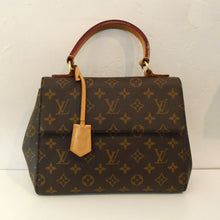 Load image into Gallery viewer, This Louis Vuitton Vintage Monogram Cluny MM Shoulder Bag is in the original Louis Vuitton Monogram pattern. It has a short front flap and camel trim. The interior of this bag is pink.
