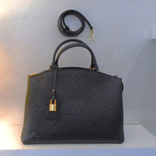 Load image into Gallery viewer, This Louis Vuitton Vintage Monogram Palais MM has large monogram embossed on the black empreinte leather.  Also included with this bag is a detachable shoulder strap and a lock and key.  It has gold hardware and the interior is a lovely shade of burgandy.
