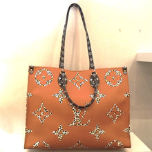 Load image into Gallery viewer, Louis Vuitton Vintage Monogram Jungle On The Go GM
