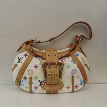 Load image into Gallery viewer, This Louis Vuitton Vintage Multi Monogram Leonor Bag has camel leather trim and gold hardware. It has a thick, double holed buckle strap on the front reinforced with gold hardware. The front and back of the bag has reinforced camel leather strips and a leather ruffle along the front flap extending to the back. The interior is a beautiful shade of burgandy.
