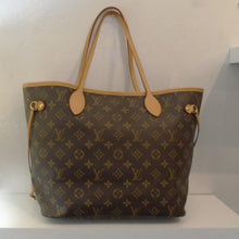 Load image into Gallery viewer, This Louis Vuitton Vintage Monogram Neverfull MM is in the original monogram pattern with double camel shoulder strap handles and side straps. The interior of this bag is tan with dark stripes.
