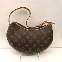 Load image into Gallery viewer, This Louis Vuitton Vintage Monogram Pochette Croissant has the original brown monogram with camel trim. It has a sturdy adjustable strap. The interior of this bag is a soft burgandy.
