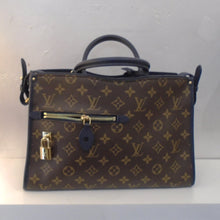 Load image into Gallery viewer, This Louis Vuitton Vintage Monogram Popincourt PM has the original Louis Vuitton monogram pattern with navy blue trim. It has a zippered pocket on one side which locks. This bag has a leather key holder attached, two carrying handles and a removable shoulder strap. The interior of this bag is navy blue.
