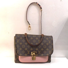 Load image into Gallery viewer, This Louis Vuitton Vintage Monogram/Pink Marignan has a pink pouch between the front flap and body of the bag. It has a brown top carrying handle with a detachable adjustable shoulder strap included. The front gold clasp has the appearance of a small lock. The interior of this bag is a beige color.
