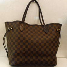 Load image into Gallery viewer, This Louis Vuitton Vintage Neverfull MM Damier Ebene has dark brown trim and side cinch straps to adjust bag size. It has gold hardware and a striking red interior.
