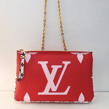 Load image into Gallery viewer, This Louis Vuitton Vintage Reverse Pochette Double Zip is red with large monogram design in white on the front side. It is pink with small white monogram on the other side. It is two pochetts attached together and has black and white trim. The leather strips attached to the zipper are also black and white. This bag has gold hardware and  the interior is pink.
