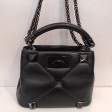 Load image into Gallery viewer, This Valentino Garavani Small Roman Studded Bag has gun metal hardware a carrying handle and a double metal mesh shoulder strap. The interior of this bag is red.
