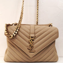 Load image into Gallery viewer, This YSL Taupe Medium College Bag has dark gold hardware which works well with the taupe color. It has a thick heavy shoulder chain that gives the bag a chic appearance. There is a pocket on the back of the bag and a zippered pocket on the inside of the bag.
