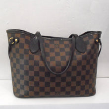 Load image into Gallery viewer, This Louis Vuitton Vintage Neverfull PM Damier Ebene tote has dark brown leather handles on top and side ties. It has a lined red interior.
