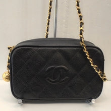 Load image into Gallery viewer, This Chanel Vintage Caviar Leather Micro Mini Bag has gold hardware and a top zippered opening. The gold shoulder chain has a black leather strip woven between the gold chain links. The bag is in the quilted diamond pattern with embroidered Chanel CCs on the front center of the bag.
