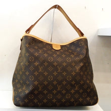 Load image into Gallery viewer, This Louis Vuitton Vintage Monogram Delightful MM has camel leather trim and a sturdy carrying handle. It has an inside top clasp for securing the bag. The lining of the bag is cream color with thin black stripes.
